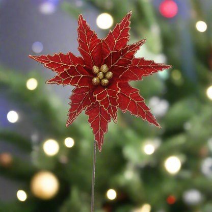 A red velvet artificial poinsettia with glitter stem, 50cm in length.