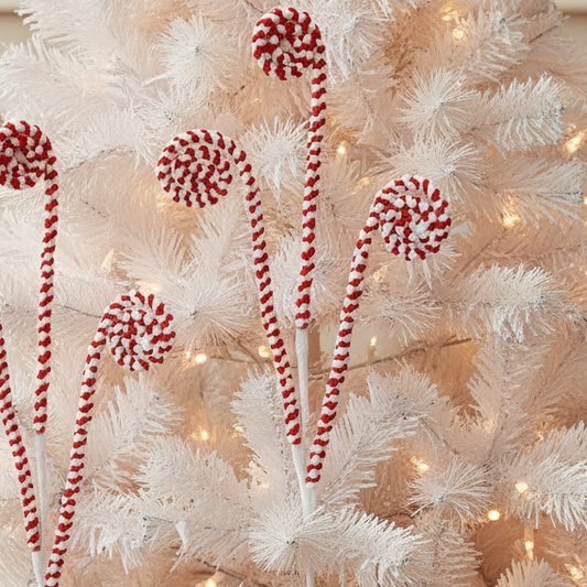 A red and white candy cane swirl stem, with three swirls, designed as a Christmas decoration.