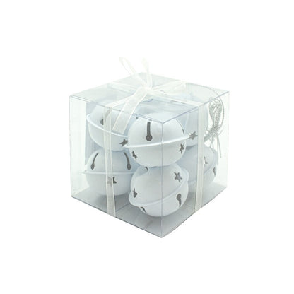 A set of white Christmas bells with decorative stars, presented in a clear plastic box with a white ribbon bow on top.