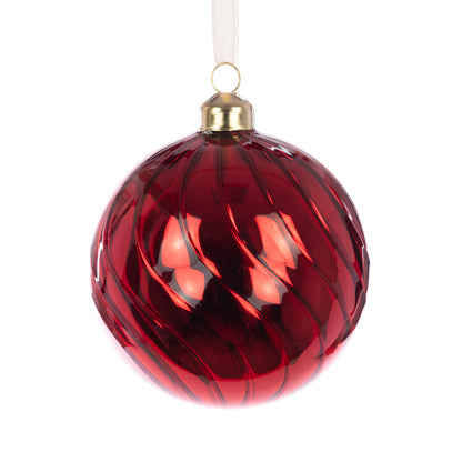 Red glass ornament with gold hook on a white background
