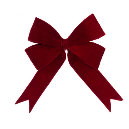 Red velvet bow on a white background