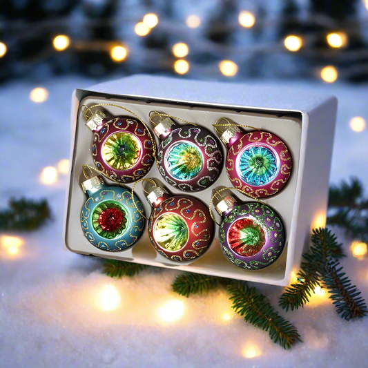 A set of six colorful glass baubles with intricate patterns, displayed in a box.