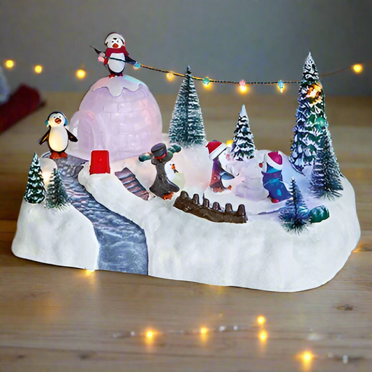 Winter scene with penguins, snowman, and decorated trees on a white background