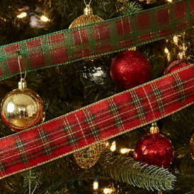 Red and green plaid ribbon on a white background