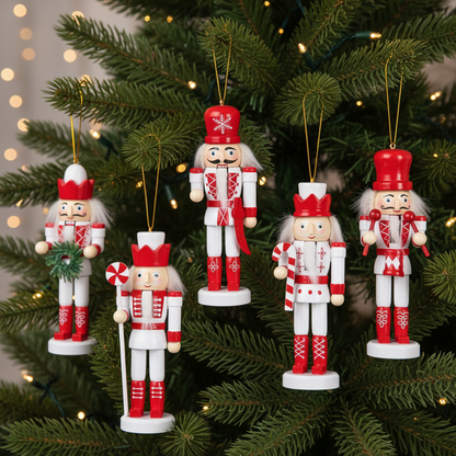 Set of 5 red and white nutcracker Christmas tree decorations, displayed in a box, with varying outfits and accessories.