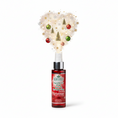 Display of 'Christmas in a Bottle' scentsicles with red packaging on a white background
