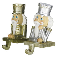 Load image into Gallery viewer, Gold and Silver Set of 2 Nutcracker Stocking Hangers
