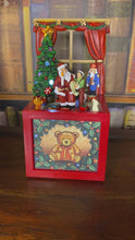 Load and play video in Gallery viewer, Christmas Animated Lit Music Box Santa And Child Scene
