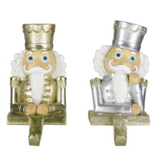 Load image into Gallery viewer, Gold and Silver Set of 2 Nutcracker Stocking Hangers
